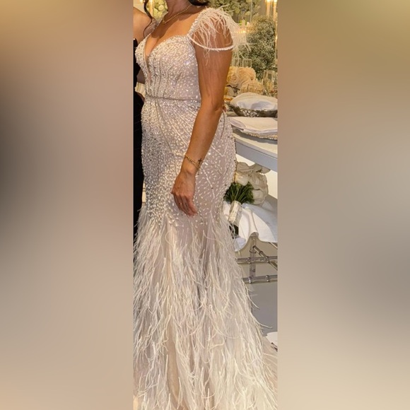 Nude evening dress with white feathers and beads - Picture 2 of 2